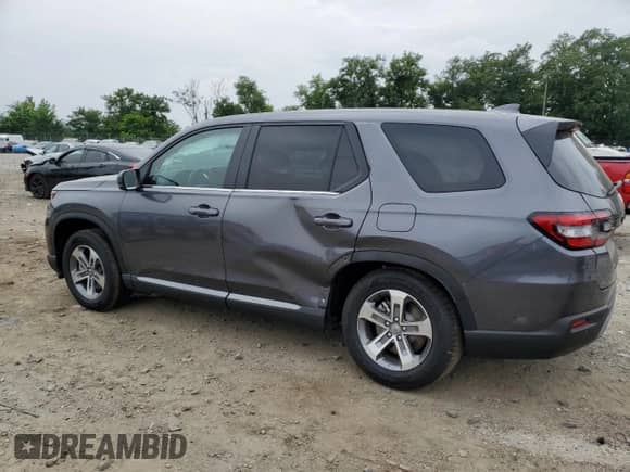 2025 Honda Pilot EX-L z VIN 5FNYG2H45SB024798, wystawiony jako Copart lot #67870725 z przebiegiem 5 927 mil mil oraz Szkoda całkowita • Salvage title. Historia ofert i sprzedaży dostępna na DreamBid. Obrazek 2.