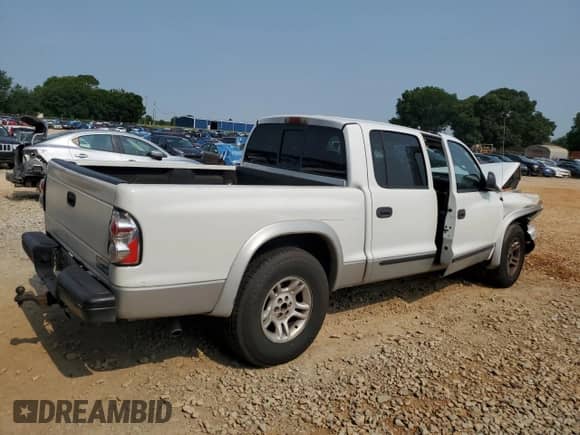 2003 Dodge Dakota SLT с VIN 1D7HL48N93S237960, выставлен на аукционе Copart как лот 58826475 с пробегом Не указан миль и Списание • Salvage title. История ставок и продаж доступна на DreamBid. Изображение 3.