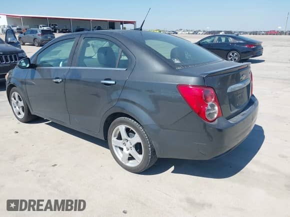 2014 Chevrolet Sonic LTZ with VIN 1G1JE5SB6E4203338, listed as a IAAI auction lot 43414724 with 126,365 mi miles and . Bid and sale history available at DreamBid. Image 3.