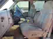 1999 Chevrolet Suburban with VIN 1GNEC16RXXJ381103, listed as a Copart auction lot 80702955 with 169,904 mi miles and Salvage title. Bid and sale history available at DreamBid. Image 7.