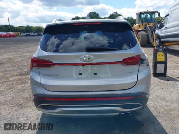 2021 Hyundai Santa Fe SEL z VIN 5NMS2DAJ6MH350076, wystawiony jako IAAI lot #43116374 z przebiegiem 45 457 mil mil oraz . Historia ofert i sprzedaży dostępna na DreamBid. Obrazek 16.