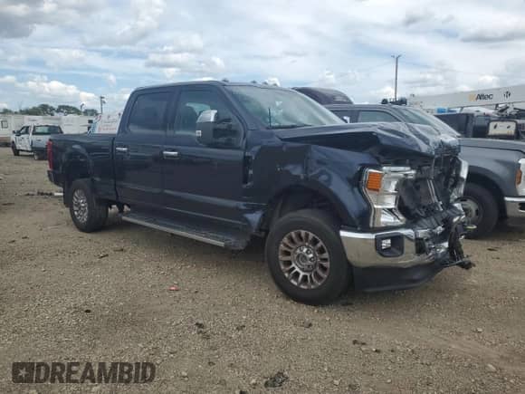 2022 Ford F-250 XL with VIN 1FT7W2B61NED71530, listed as a Copart auction lot 70491615 with 52,923 mi miles and Salvage title. Bid and sale history available at DreamBid. Image 4.