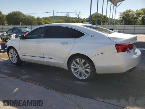 2017 Chevrolet Impala Premier z VIN 1G1145S32HU164294, wystawiony jako Copart lot #70271965 z przebiegiem 130 435 mil mil oraz Szkoda całkowita • Salvage title. Historia ofert i sprzedaży dostępna na DreamBid. Obrazek 2.