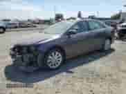 2012 Toyota Camry LE with VIN 4T1BD1FK1CU019371, listed as a Copart auction lot 65996385 with 204,081 mi miles and Salvage title. Bid and sale history available at DreamBid. Image 1.