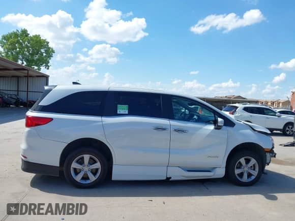 2020 Honda Odyssey EX-L with VIN 5FNRL6H77LB021095, listed as a IAAI auction lot 42581910 with 50,608 mi miles and . Bid and sale history available at DreamBid. Image 14.