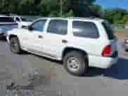 1999 Dodge Durango z VIN 1B4HS28Z7XF506442, wystawiony jako IAAI lot #42611396 z przebiegiem 200 467 mil mil oraz . Historia ofert i sprzedaży dostępna na DreamBid. Obrazek 3.