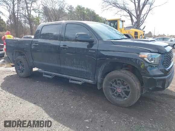 2021 Toyota Tundra SR5 with VIN 5TFDY5F10MX964425, listed as a IAAI auction lot 41843735 with 108,005 mi miles and . Bid and sale history available at DreamBid. Image 1.