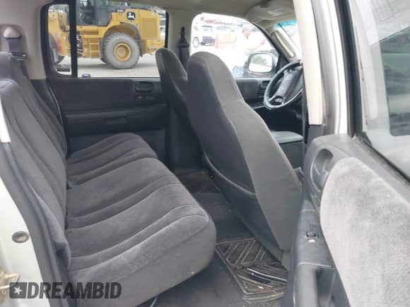 2001 Dodge Dakota Sport z VIN 1B7HG2AN91S225379, wystawiony jako IAAI lot #42443304 z przebiegiem 209 957 mil mil oraz . Historia ofert i sprzedaży dostępna na DreamBid. Obrazek 8.
