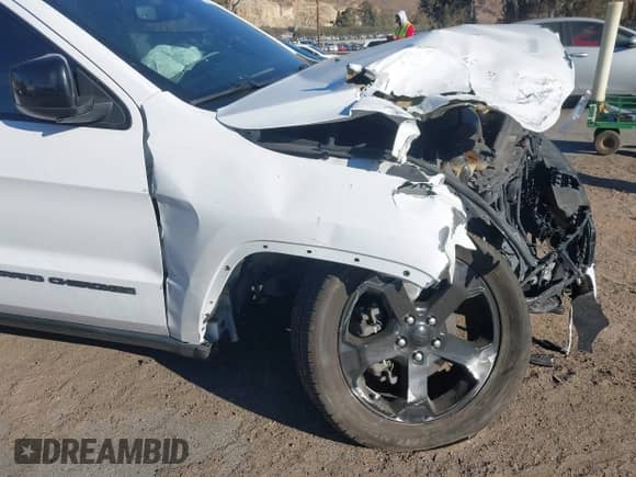 2018 Jeep Grand Cherokee Laredo E z VIN 1C4RJFAGXJC353073, wystawiony jako IAAI lot #41380622 z przebiegiem 85 365 mil mil oraz . Historia ofert i sprzedaży dostępna na DreamBid. Obrazek 19.