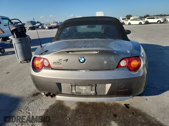 2004 BMW Z4 3.0i with VIN 4USBT53564LT25710, listed as a Copart auction lot 80996885 with 80,517 mi miles and Salvage title. Bid and sale history available at DreamBid. Image 6.