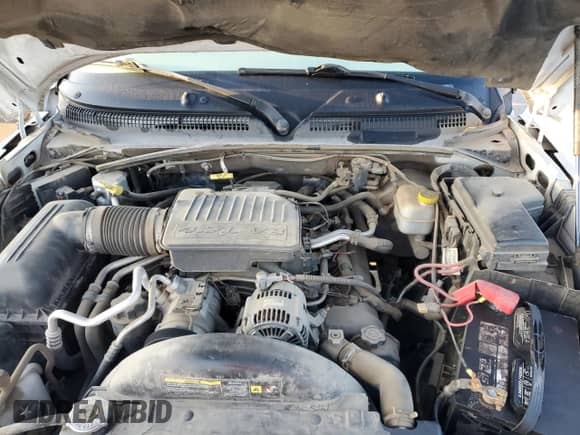 2006 Dodge Dakota SLT with VIN 1D7HE48N56S605551, listed as a Copart auction lot 80346855 with 107,354 mi miles and Salvage title. Bid and sale history available at DreamBid. Image 11.