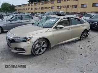 2020 Honda Accord Touring с VIN 1HGCV2F9XLA000345, выставлен на аукционе Copart как лот 70529615 с пробегом 93 129 миль миль и Чистый • Clean title. История ставок и продаж доступна на DreamBid. Изображение 1.