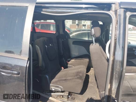 2013 Dodge Grand Caravan American Value with VIN 2C4RDGBG1DR601010, listed as a IAAI auction lot 43293889 with 156,529 mi miles and . Bid and sale history available at DreamBid. Image 8.
