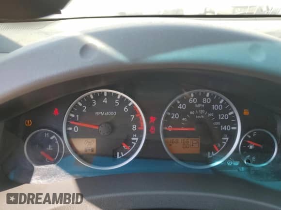 2007 Nissan Frontier LE z VIN 1N6AD09W77C445809, wystawiony jako Copart lot #69156535 z przebiegiem 168 166 mil mil oraz Szkoda całkowita • Salvage title. Historia ofert i sprzedaży dostępna na DreamBid. Obrazek 9.