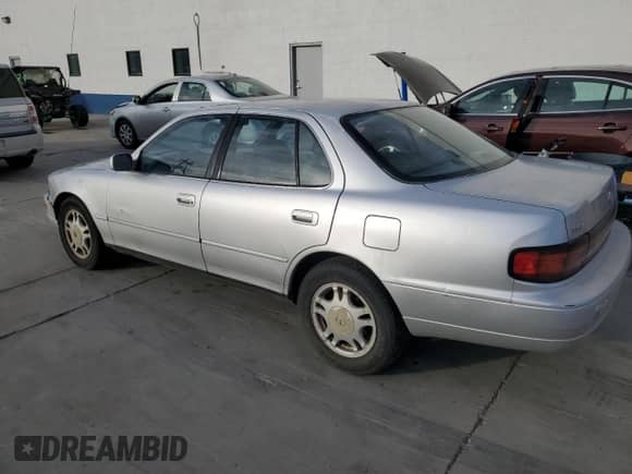 1992 Toyota Camry с VIN JT2VK13E7N0096822, выставлен на аукционе Copart как лот 71635274 с пробегом 172 511 миль миль и Списание • Salvage title. История ставок и продаж доступна на DreamBid. Изображение 2.