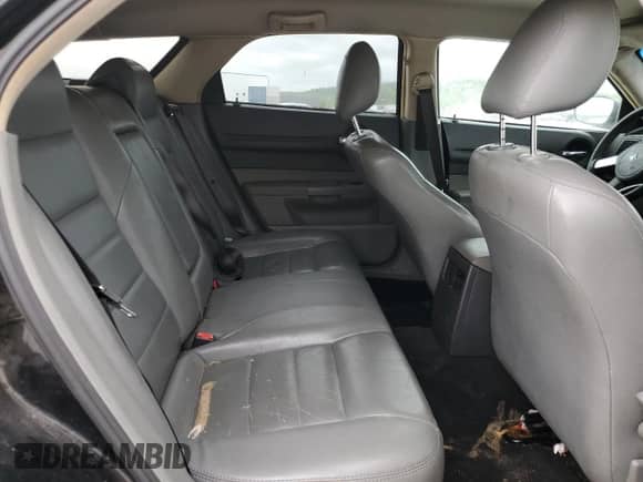 2005 Dodge Magnum SE z VIN 2D4FV48V65H166659, wystawiony jako Copart lot #53880845 z przebiegiem 240 798 mil mil oraz Nie do naprawy • Non repairable. Historia ofert i sprzedaży dostępna na DreamBid. Obrazek 10.