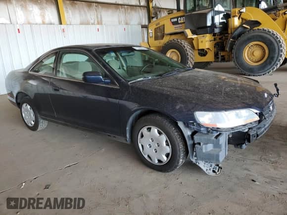 2000 Honda Accord z VIN 1HGCG3163YA008792, wystawiony jako Copart lot #71320354 z przebiegiem 134 856 mil mil oraz Szkoda całkowita • Salvage title. Historia ofert i sprzedaży dostępna na DreamBid. Obrazek 4.