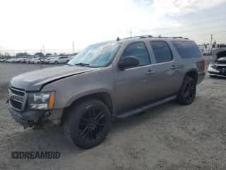 2012 Chevrolet Suburban LT с VIN 1GNSKJE73CR243033, выставлен на аукционе Copart как лот 70002755 с пробегом 168 107 миль миль и Списание • Salvage title. История ставок и продаж доступна на DreamBid. Изображение 1.