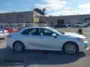 2020 Toyota Camry Hybrid XLE with VIN 4T1F31AK4LU523702, listed as a IAAI auction lot 42734831 with 144,778 mi miles and . Bid and sale history available at DreamBid. Image 13.