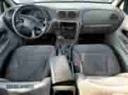 2003 Chevrolet TrailBlazer EXT LT z VIN 1GNET16S636154104, wystawiony jako Copart lot #66277475 z przebiegiem 235 858 mil mil oraz Nie do naprawy • Non repairable. Historia ofert i sprzedaży dostępna na DreamBid. Obrazek 8.