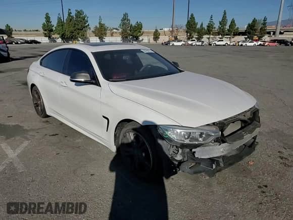 2015 BMW 4 Series 428i z VIN WBA4A9C58FGL85766, wystawiony jako Copart lot #69790975 z przebiegiem 93 413 mil mil oraz Szkoda całkowita • Salvage title. Historia ofert i sprzedaży dostępna na DreamBid. Obrazek 14.