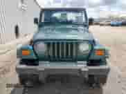 2000 Jeep Wrangler SE with VIN 1J4FA29P2YP800721, listed as a Copart auction lot 67490145 with 128,182 mi miles and Clean title. Bid and sale history available at DreamBid. Image 5.