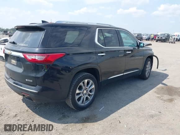 2018 Chevrolet Traverse Premier z VIN 1GNERKKW1JJ269376, wystawiony jako IAAI lot #43187600 z przebiegiem 137 649 mil mil oraz . Historia ofert i sprzedaży dostępna na DreamBid. Obrazek 4.