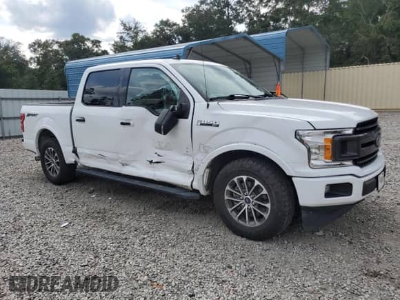 2019 Ford F-150 XL with VIN 1FTEW1CP2KFC16323, listed as a Copart auction lot 70815735 with 94,718 mi miles and Salvage title. Bid and sale history available at DreamBid. Image 4.