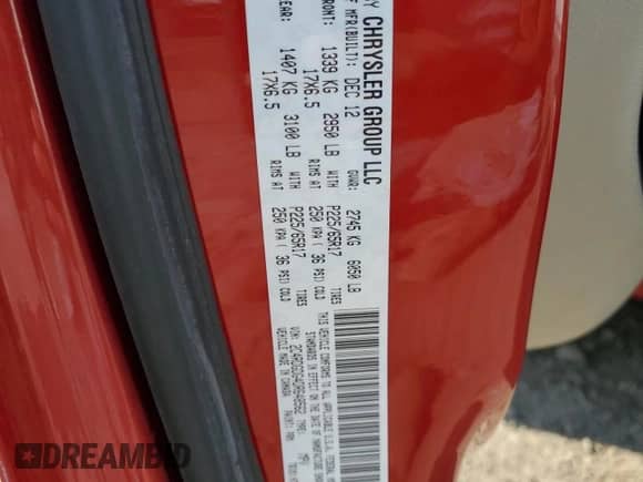 2013 Dodge Grand Caravan Crew with VIN 2C4RDGDG4DR648562, listed as a Copart auction lot 67687185 with 76,182 mi miles and Salvage title. Bid and sale history available at DreamBid. Image 13.