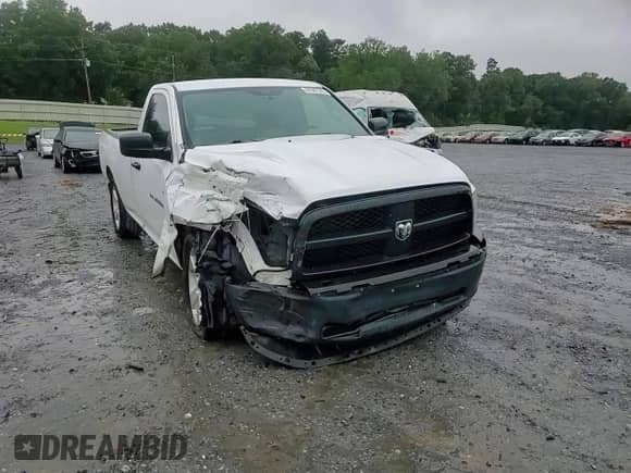 2012 Ram 1500 ST z VIN 3C6JD6DP4CG276904, wystawiony jako Copart lot #67687515 z przebiegiem 223 507 mil mil oraz Szkoda całkowita • Salvage title. Historia ofert i sprzedaży dostępna na DreamBid. Obrazek 13.
