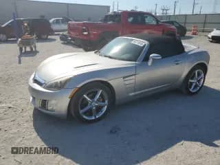 2009 Saturn Sky Red Line with VIN 1G8MT35X69Y106090, listed as a Copart auction lot 59311614 with 76,224 mi miles and Clean title. Bid and sale history available at DreamBid. Image 1.