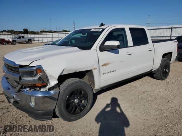 2016 Chevrolet Silverado 1500 LT with VIN 3GCUKREC1GG377834, listed as a Copart auction lot 84995595 with 214,140 mi miles and Salvage title. Bid and sale history available at DreamBid. Image 1.