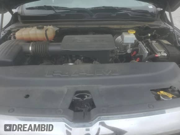 2022 Ram 1500 Big Horn z VIN 1C6RREFG5NN336193, wystawiony jako Copart lot #65991865 z przebiegiem Nie podano mil oraz Szkoda całkowita • Salvage title. Historia ofert i sprzedaży dostępna na DreamBid. Obrazek 11.