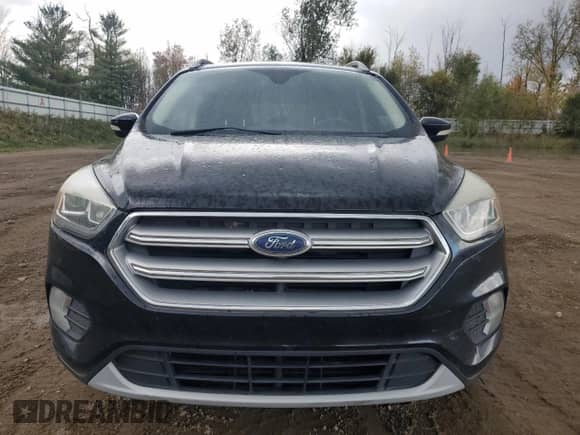 2017 Ford Escape Titanium с VIN 1FMCU0JD9HUE22755, выставлен на аукционе Copart как лот 87491745 с пробегом 158 322 миль миль и Чистый • Clean title. История ставок и продаж доступна на DreamBid. Изображение 5.