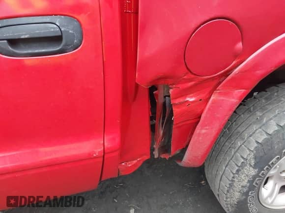 2002 Dodge Dakota Sport с VIN 1B7HG38N52S510495, выставлен на аукционе IAAI как лот 41694757 с пробегом 254 713 миль миль и . История ставок и продаж доступна на DreamBid. Изображение 15.