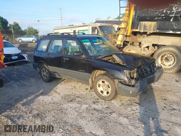 1999 Subaru Forester L with VIN JF1SF6352XH707734, listed as a IAAI auction lot 42783352 with 125,177 mi miles and . Bid and sale history available at DreamBid. Image 1.