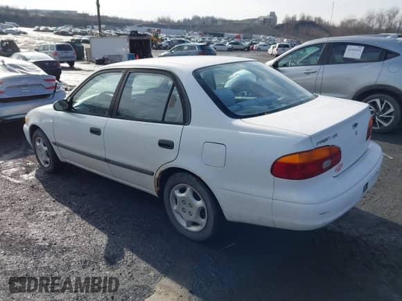 2001 Chevrolet Prizm with VIN 1Y1SK52871Z432340, listed as a IAAI auction lot 41465388 with 122,272 mi miles and . Bid and sale history available at DreamBid. Image 3.