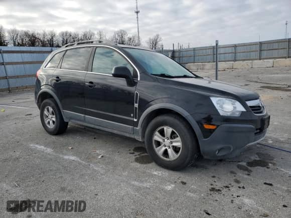 2009 Saturn VUE XE with VIN 3GSDL43N49S610419, listed as a Copart auction lot 82816824 with 198,559 mi miles and Salvage title. Bid and sale history available at DreamBid. Image 4.