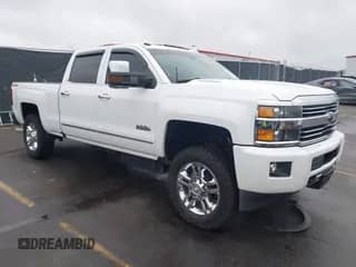 2016 Chevrolet Silverado 2500HD High Country z VIN 1GC1KXE82GF149345, wystawiony jako IAAI lot #40887698 z przebiegiem 126 593 mil mil oraz . Historia ofert i sprzedaży dostępna na DreamBid. Obrazek 1.
