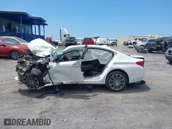 2019 BMW 5 Series 540i with VIN WBAJE5C52KG919922, listed as a IAAI auction lot 43174157 with Not provided miles and . Bid and sale history available at DreamBid. Image 13.