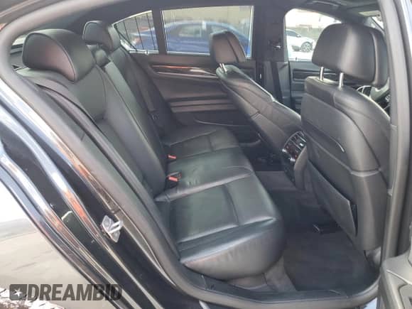 2015 BMW 7 Series 740i с VIN WBAYA6C50FGK16244, выставлен на аукционе Copart как лот 84005165 с пробегом 137 489 миль миль и Списание • Salvage title. История ставок и продаж доступна на DreamBid. Изображение 10.