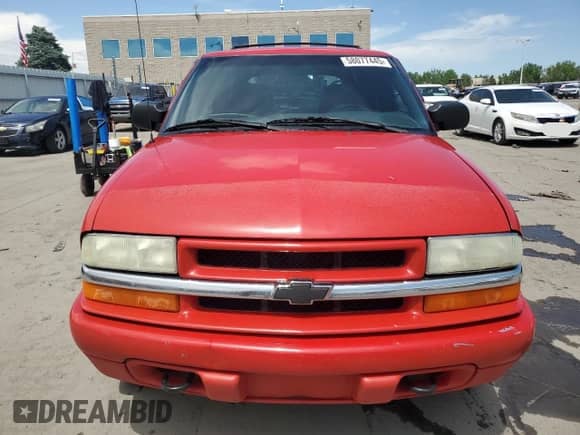 2004 Chevrolet Blazer LS z VIN 1GNDT13X44K121431, wystawiony jako Copart lot #58077445 z przebiegiem 199 465 mil mil oraz Szkoda całkowita • Salvage title. Historia ofert i sprzedaży dostępna na DreamBid. Obrazek 5.