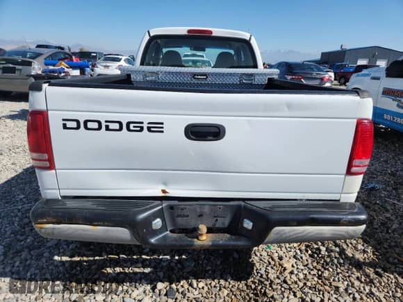 2001 Dodge Dakota с VIN 1B7GL22X61S221703, выставлен на аукционе Copart как лот 84961715 с пробегом 132 893 миль миль и Списание • Salvage title. История ставок и продаж доступна на DreamBid. Изображение 6.
