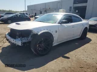 2023 Dodge Charger Scat Pack with VIN 2C3CDXGJ3PH631571, listed as a Copart auction lot 70278955 with 27,755 mi miles and Salvage title. Bid and sale history available at DreamBid. Image 1.