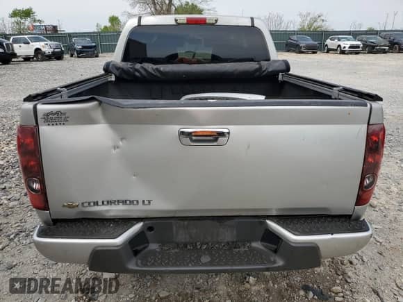 2012 Chevrolet Colorado 1LT z VIN 1GCDSCFE2C8135938, wystawiony jako Copart lot #51916935 z przebiegiem Nie podano mil oraz Szkoda całkowita • Salvage title. Historia ofert i sprzedaży dostępna na DreamBid. Obrazek 6.