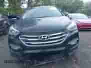 2017 Hyundai Santa Fe 2.4L with VIN 5XYZU3LB9HG382819, listed as a IAAI auction lot 43140154 with 138,527 mi miles and . Bid and sale history available at DreamBid. Image 12.