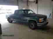 1995 GMC Sierra 1500 z VIN 2GTEC19K2S1558740, wystawiony jako Copart lot #69398185 z przebiegiem 386 899 mil mil oraz Szkoda całkowita • Salvage title. Historia ofert i sprzedaży dostępna na DreamBid. Obrazek 4.