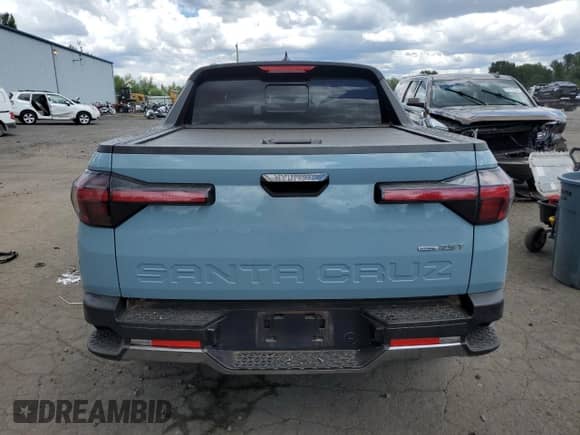 2022 Hyundai Santa Cruz Limited with VIN 5NTJEDAF5NH014956, listed as a Copart auction lot 61217295 with 35,760 mi miles and Salvage title. Bid and sale history available at DreamBid. Image 6.