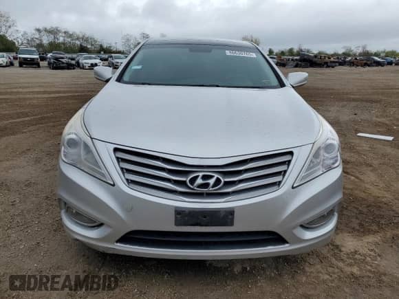2013 Hyundai Azera с VIN KMHFH4JG6DA270769, выставлен на аукционе Copart как лот 86630765 с пробегом 133 252 миль миль и Списание • Salvage title. История ставок и продаж доступна на DreamBid. Изображение 5.