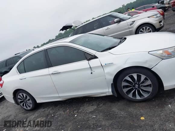 2014 Honda Accord Touring z VIN 1HGCR6F76EA010139, wystawiony jako IAAI lot #42399395 z przebiegiem 294 787 mil mil oraz . Historia ofert i sprzedaży dostępna na DreamBid. Obrazek 13.